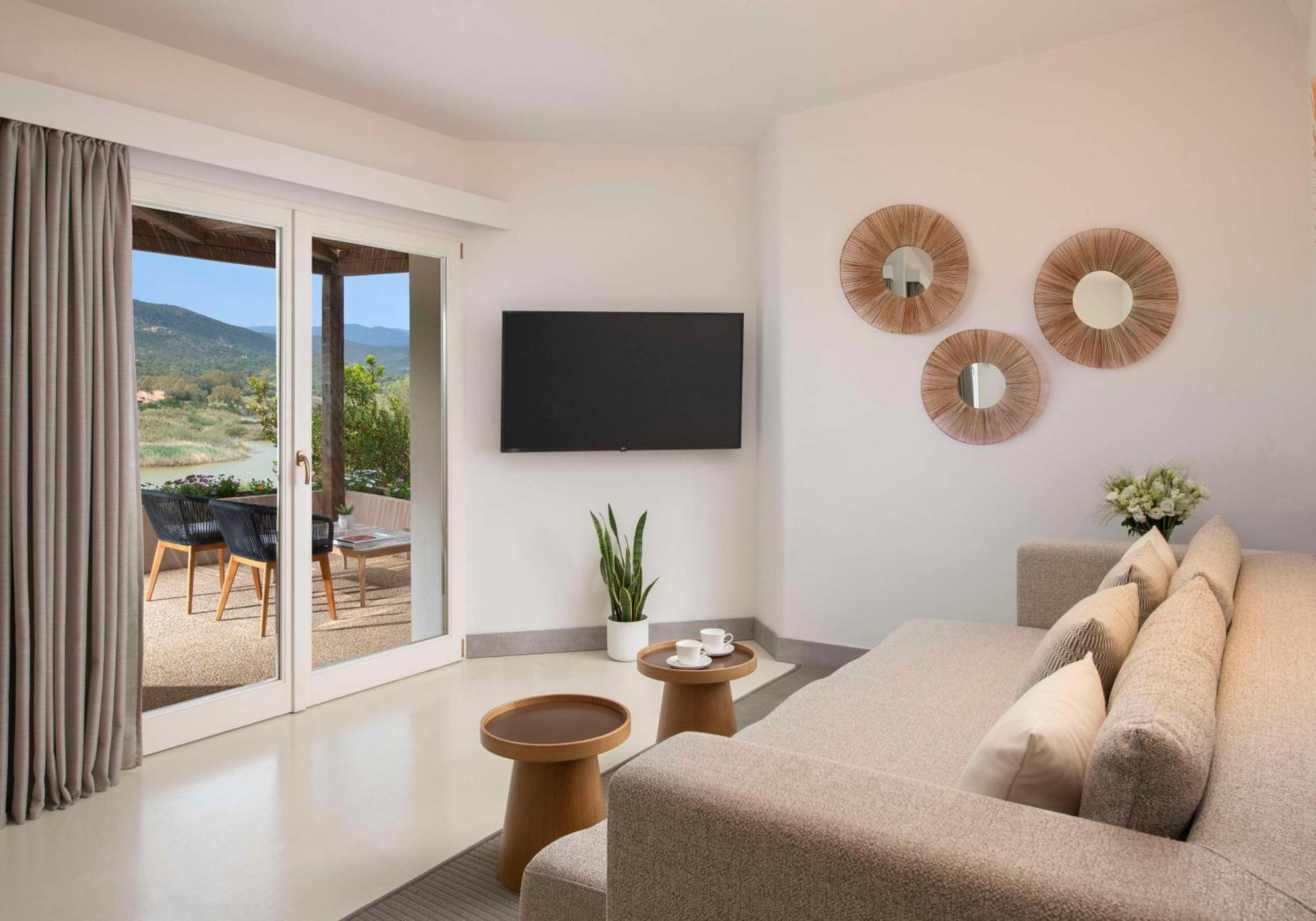 Baia Di Chia Resort Sardinia, Curio Collection By Hilton Exterior foto