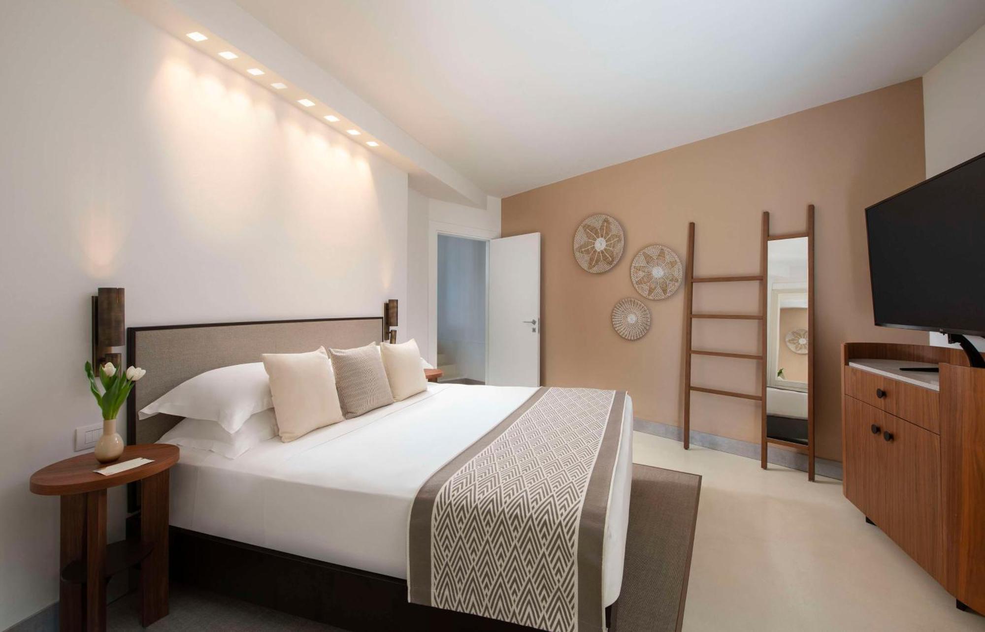 Baia Di Chia Resort Sardinia, Curio Collection By Hilton Exterior foto