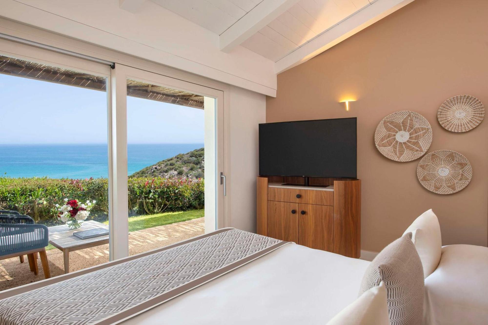 Baia Di Chia Resort Sardinia, Curio Collection By Hilton Exterior foto